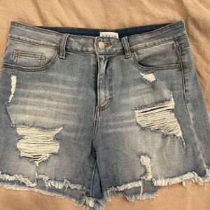 Super stretchy longer inseam distressed jean short